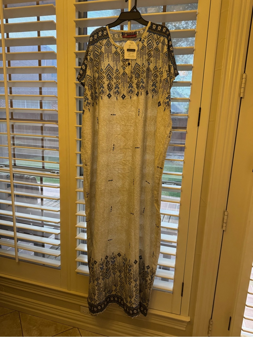 Boho-Inspired White Maxi Dress with Navy Pattern
